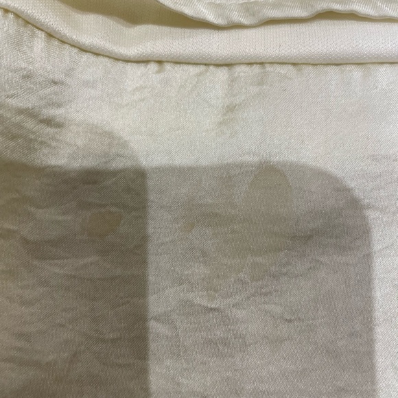 Silky top with black lace trimming on neck area. - Picture 7 of 11